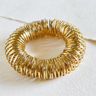 Solid brass statement bangle torsion bisjoux exclusive