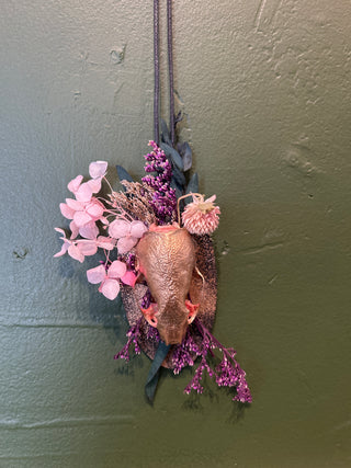 Gilded skull and floral ornament by Jonathan Joseph Peters